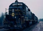 Seaboard Coast Line GP38-2 #544, tied down on the south end of #1 track.  In the distance, the searchlight signal displays a restricted proceed for a departing southbound and the dwarf signal displays a stop indication for the siding 